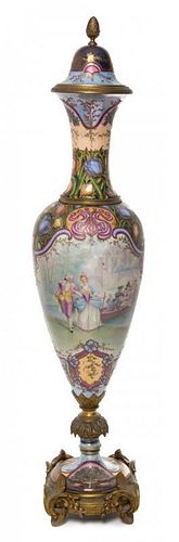 * A Sevres Gilt Bronze Mounted Porcelain Urn Height 32 inches.