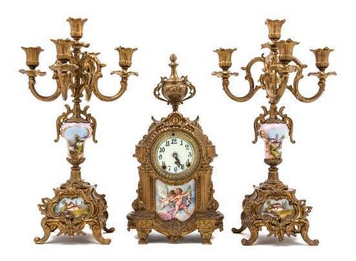 A Sevres Style Porcelain Mounted Gilt Bronze Clock Garniture Height of candelabra 18 inches.
