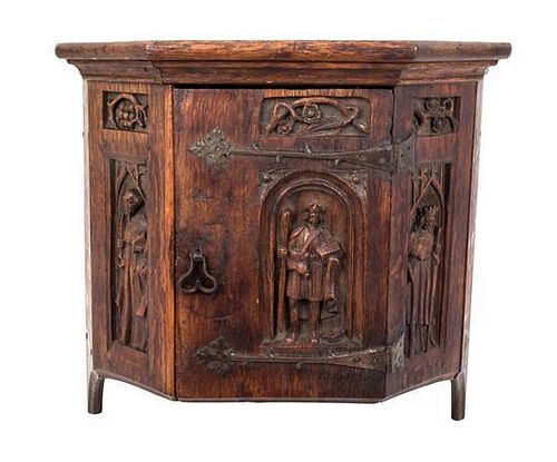 * A Gothic Oak Hanging Cabinet Height 19 3/4 x width 20 1/2 x depth 10 inches.