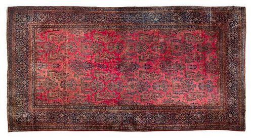 * A Sarouk Wool Rug 20 feet 6 inches x 11 feet 8 inches.