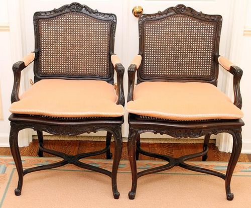 FRENCH STYLE CARVED WALNUT & CANE FAUTEUILS PAIR