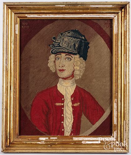Victorian needlework of a young man in a red vest