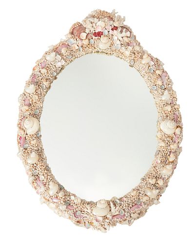 An oval shell wall mirror