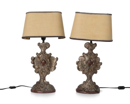 A pair of carved wood boudoir lamps