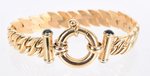 A 14k Gold and Onyx Bracelet