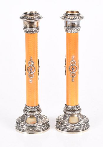 A Pair of Russian Silver Candlesticks