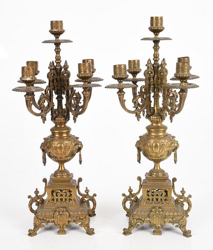 A pair of Renaissance Revival gilt bronze candelabra