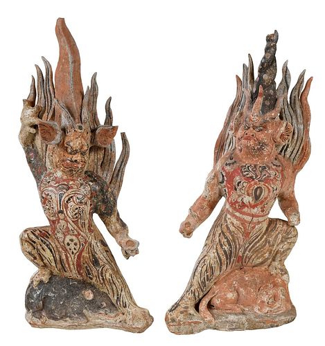 Two Polychrome Painted Earth Spirits