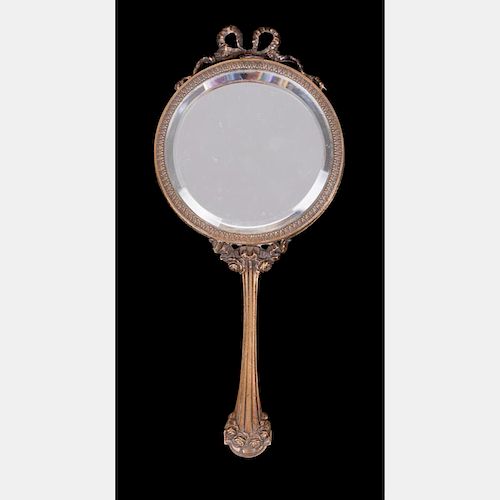 A Tiffany Co. Bronze Hand Mirror,