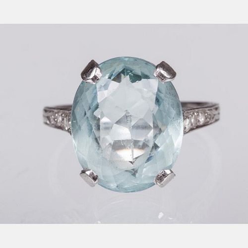 A Platinum, Aquamarine, and Diamond Ring,