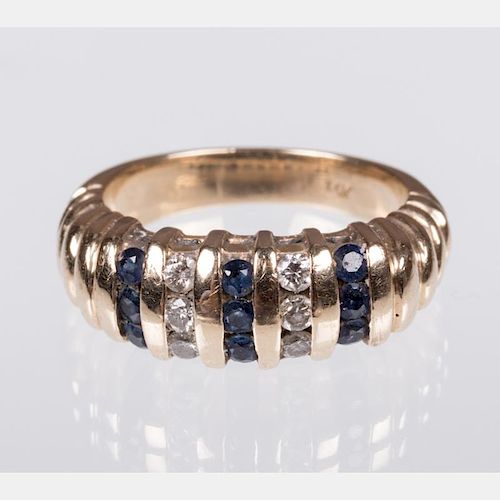 A 14kt. Yellow Gold, Diamond and Sapphire Ring,