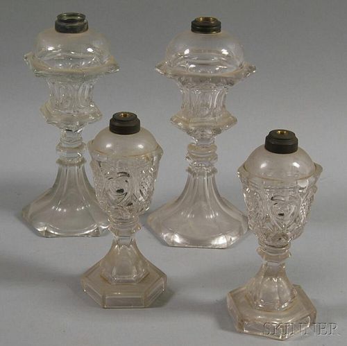 Two Pairs of Colorless Glass Oil Lamps