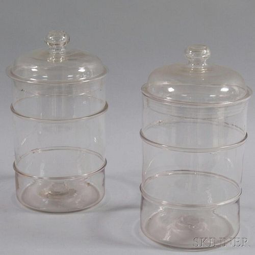 Pair of Colorless Glass Covered Jars