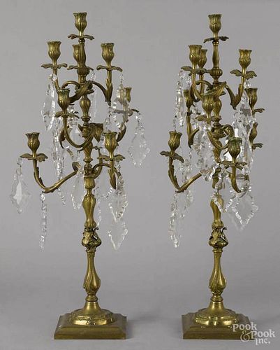 Pair of large bronze candelabra, late 19th c., with hanging glass pendants, 35 1/2'' h.
