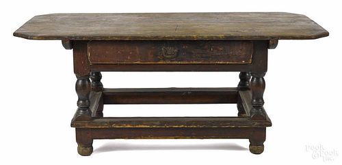 Continental pine tavern table, ca. 1730, with a cut corner top and a single drawer