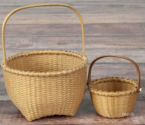Karen Wychock, two splint baskets, initialed, one dated '94, 6'' h. and 3 1/2'' h.