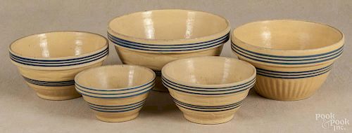 Nest of five yelloware mixing bowls, ca. 1900, largest - 5 1/4'' h., 10 3/4'' dia.