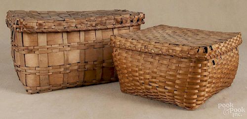 Two Maine splint Native American baskets, 19th c., 8'' h., 10 1/2'' w. and 11'' h., 18 1/2'' w.