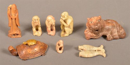 Eight Carved Stone Figures.