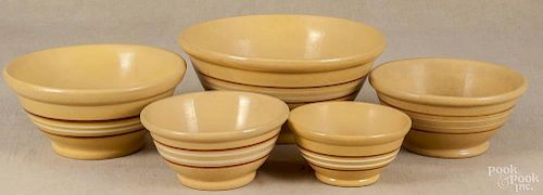Nesting set of five yelloware mixing bowls, 19th c., largest - 6'' h., 12 1/2'' dia.