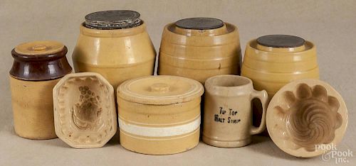 Eight pieces of yelloware, ca. 1900, to include four jars, two food molds, a butter tub, and a mug