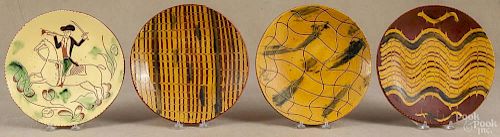 Lester Breininger, four redware plates, signed and dated 1984 and 1985, largest - 10 1/2'' dia.