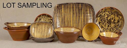 Fourteen pieces of contemporary Colonial Williamsburg redware, platter - 15'' w., 12'' d.