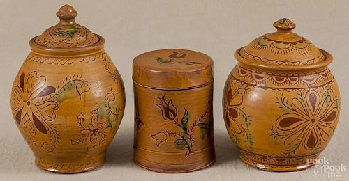 Karen O'Connor Kohler, three redware covered jars, signed, one dated 1987, tallest - 8''.