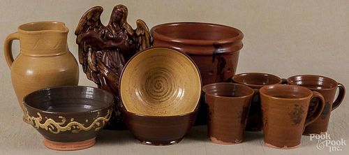 Nine pieces of contemporary redware, seven impressed Woodstock Conn