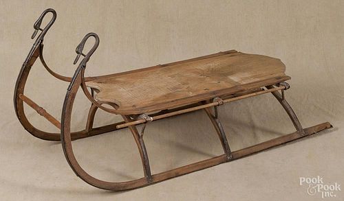 Child's sled, 19th c., with cast iron swans neck terminals, 37'' l.