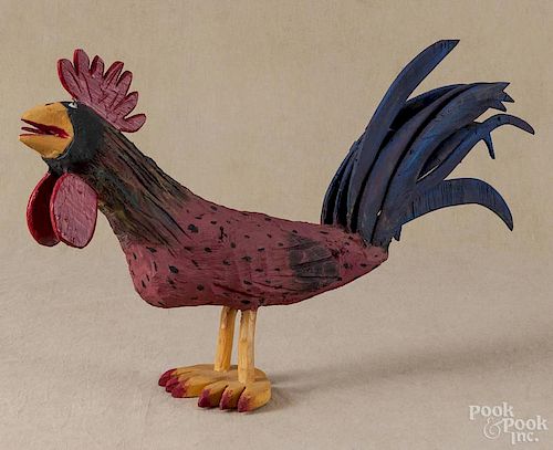 Carved and painted outsider art rooster, signed Miguel Rodriguez 2-2-2000, 15'' h., 26'' l.