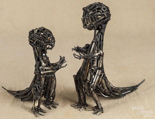 Two metal outsider art dinosaurs, made from nuts, bolts, and screws, 15 3/4'' h. and 12 3/4'' h.