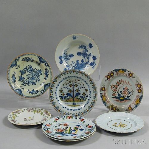 Eight Mostly Polychrome Delft Plates