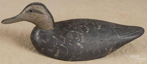 Carved and painted black duck decoy, mid 20th c., 17 1/2'' l.