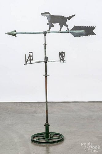 Contemporary tin hunting dog weathervane, 20th c., on a cast iron stand, 46 1/2'' h.