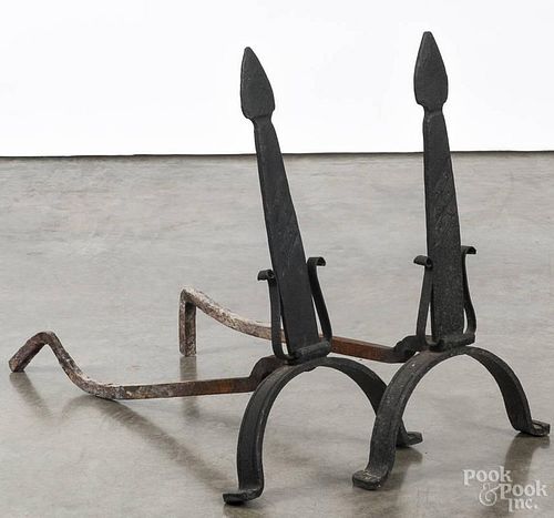 Pair of arts and crafts wrought iron andirons, early 20th c., 22'' h.