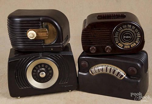 Four plastic radios, mid 20th c., to include Fada bullet, RCA, Philco, and Zenith