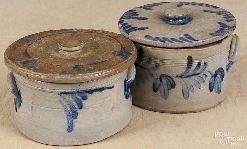 Two stoneware lidded cake crocks, 19th c., with cobalt floral decoration, 5 3/4'' h., 8 1/2'' dia.