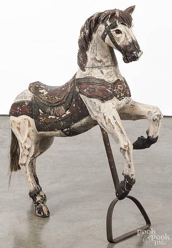 Carved and painted horse ride-on toy, ca. 1900, 33 1/2'' h.