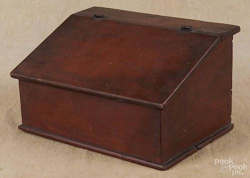 Pennsylvania painted pine box, early 19th c., retaining the original red surface, 6 1/2'' h.