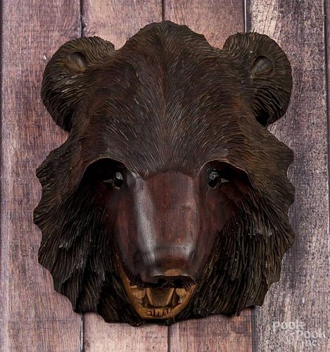 Black Forest carved bear plaque, mid 20th c., 12 1/2'' h., 11'' w.