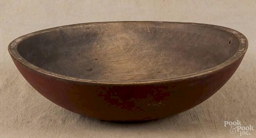 Painted turned wooden bowl, 19th c., retaining a red surface, 15 3/4'' dia.