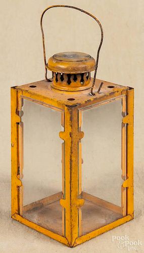 English painted tin carry lantern, early 20th c., 6 1/4'' h.