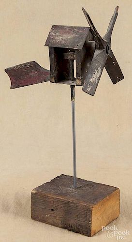 Painted wood and tin whirligig, ca. 1900, 18'' h., 10'' l.