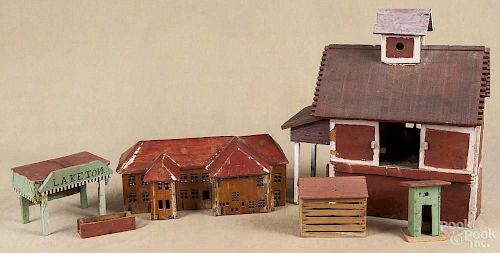Primitive painted toy barn, ca. 1900, made from shipping crates, together with an outhouse