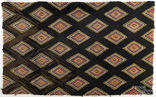 Pair of hooked rugs, early 20th c., with repeating diamonds on a black field, 34'' x 54''