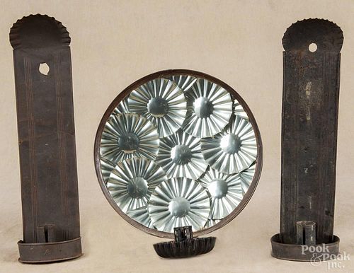 Pair of tin candle wall sconces, 19th c., 12'' h., together with a contemporary tin candle sconce