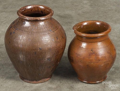 Two Pennsylvania redware crocks, 19th c., 6 1/4'' h. and 8'' h.