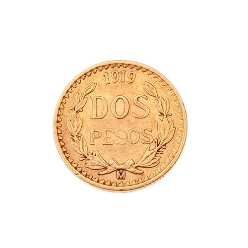 Moneda de Dos pesos en oro amarillo de 21k. Peso: 1.6 g.