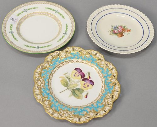 Two sets of luncheon porcelain plates to include a set of twelve French porcelain painted flower plates, twelve Minton Kent plates, ...